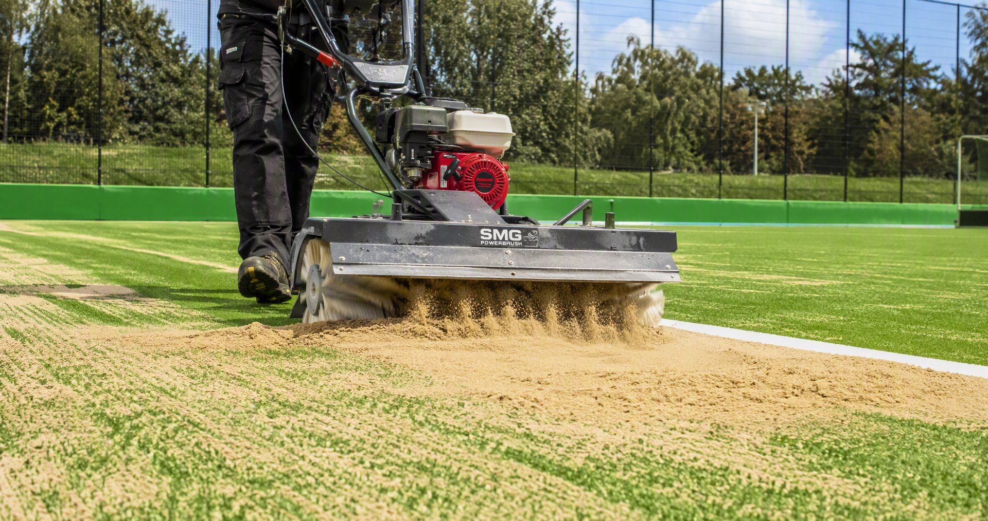 Silica sand infill brushed into hockey turf — Hockey Grass SA